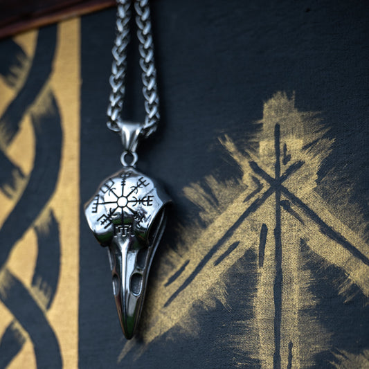 Ravenritual Huginn and Muninn Norse raven necklace against a dark background